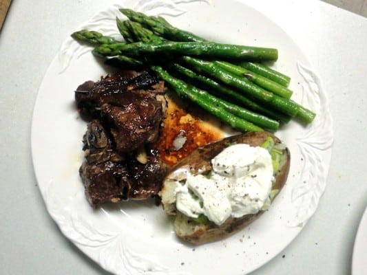 Herb Roasted Lamb Chops with Aparagus And a Baked Potato
