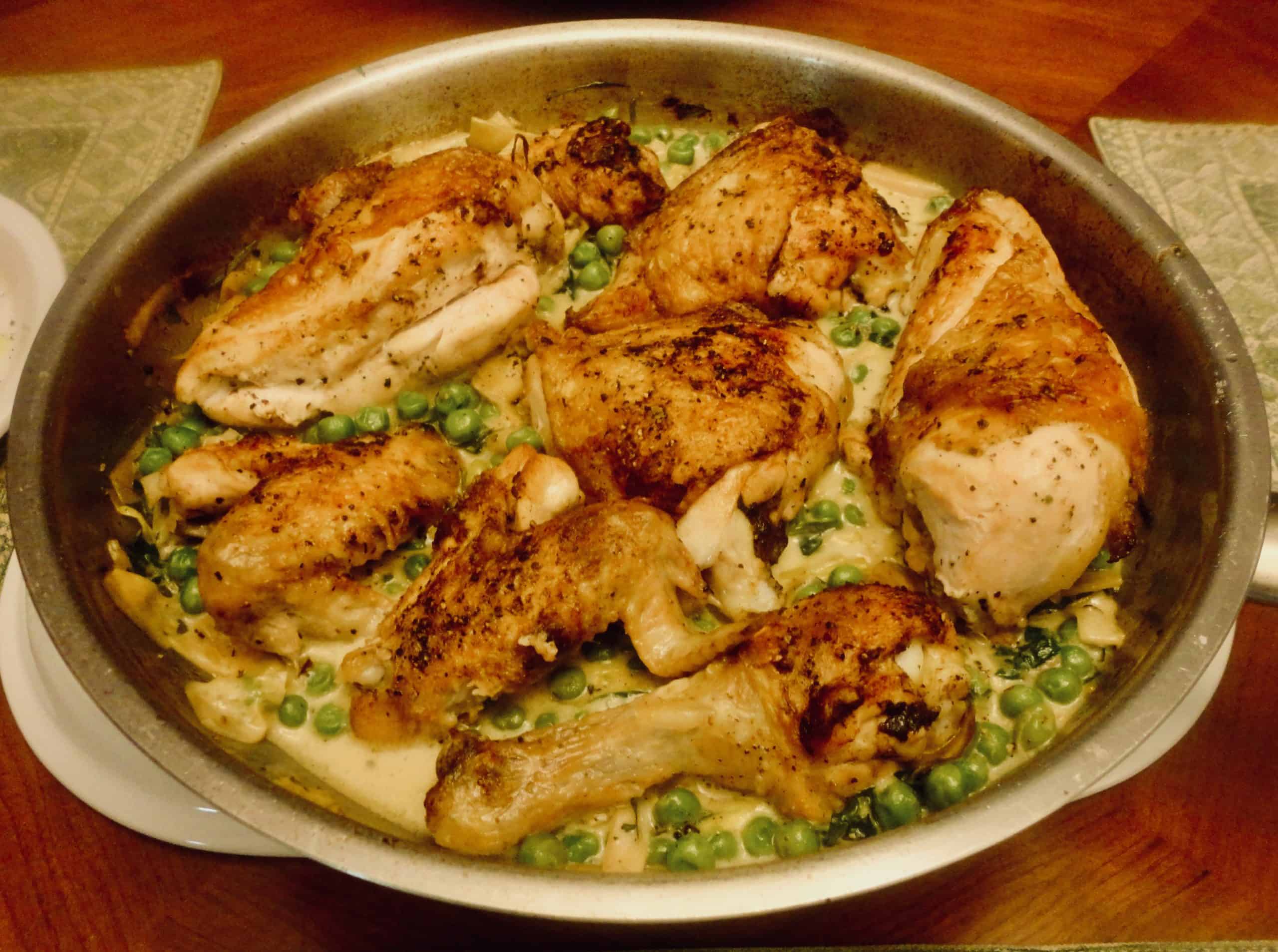 Vinegar-Braised Chicken on a bed of Leeks and Peas adapted from Grace Parisi of Food and Wine Magazine with Heirloom Tomatoes and Burrata