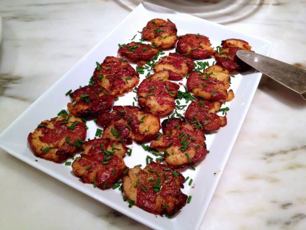 Photo showing Crispy Smashed Potatoes and Chives