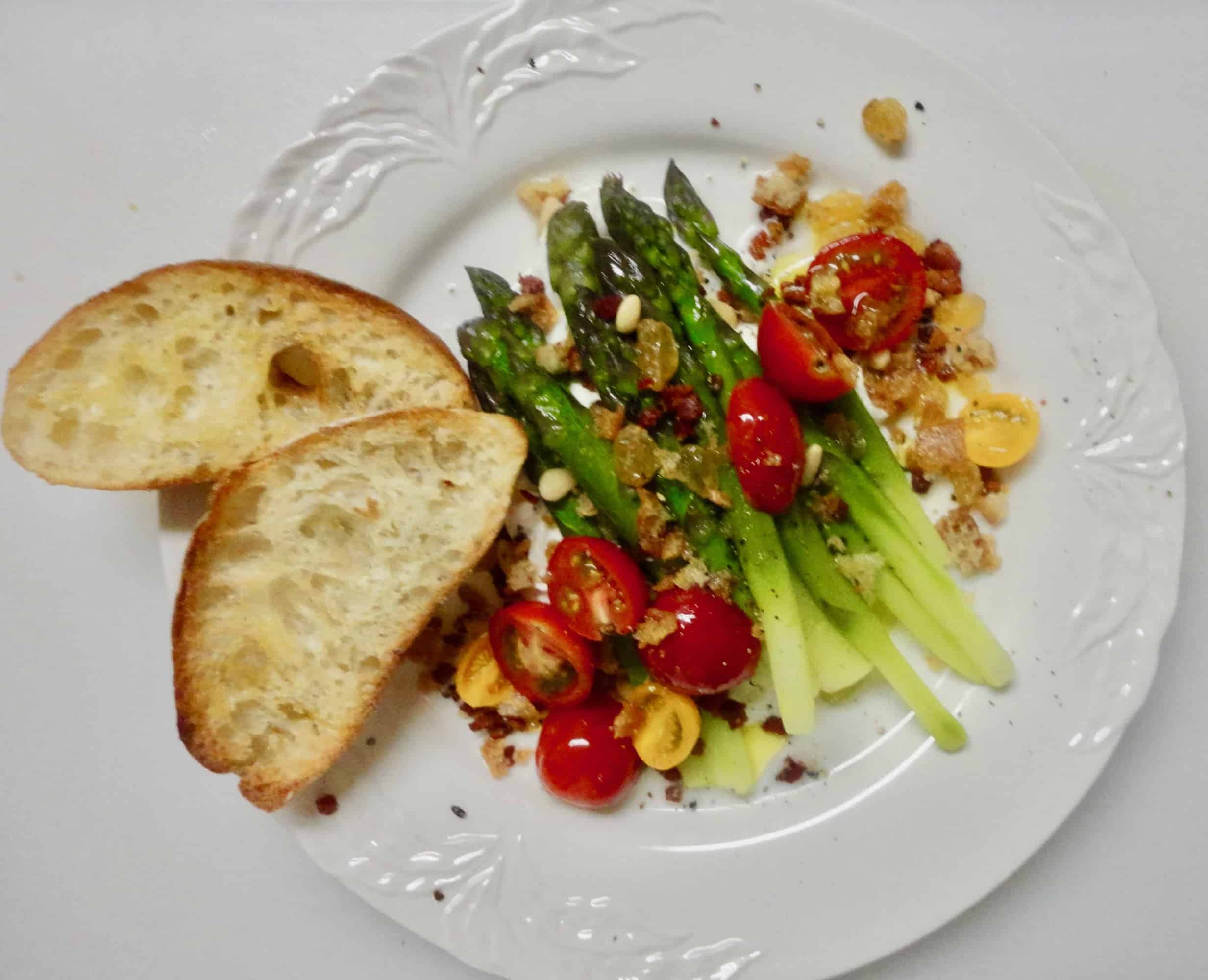 Fresh Asparagus Salad with Buratta, Pancetta, Pine Nuts, Raisins and Bread Crumbs and Tiny Tomatoes