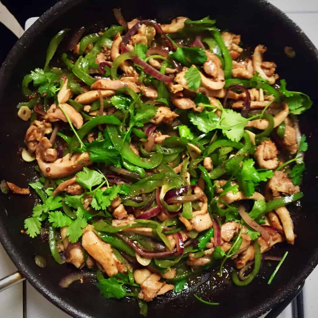 Stir-Fried Chicken, Green Peppers and Cilantro with Xian Province flavors Of Cumin and Coriander