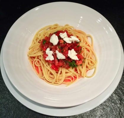 I am back from Europe with a perfect dish for a summer night: Hot Pasta with a Cold Tomato Sauce