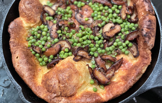DUTCH BABY WITH MUSHROOMS, CHEESE AND PEAS