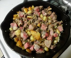 James Beard's Roast Beef Hash in skillet before the Cream is added