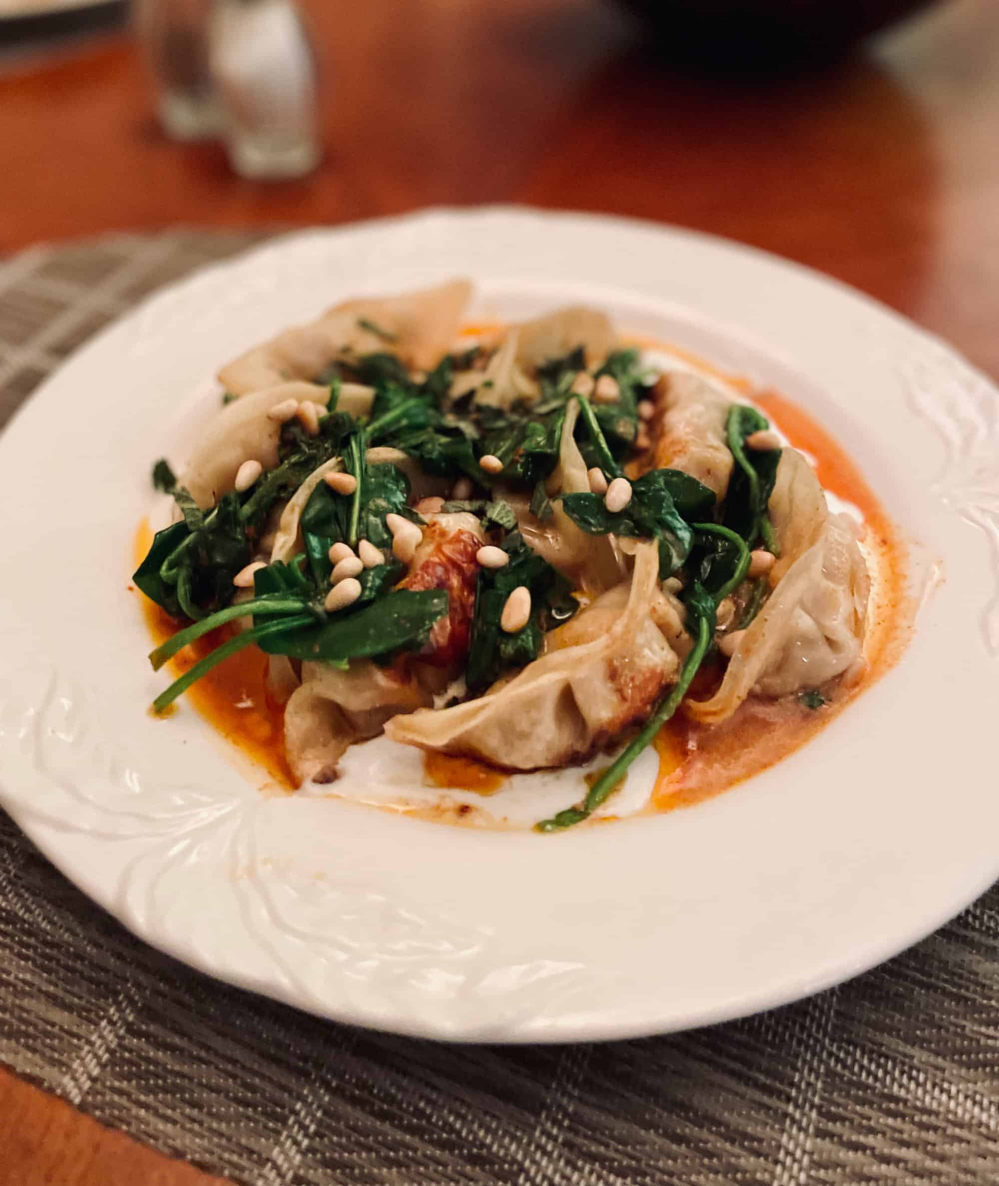 STORE-BOUGHT ASIAN DUMPLINGS WITH GREENS AND CHILE BUTTER