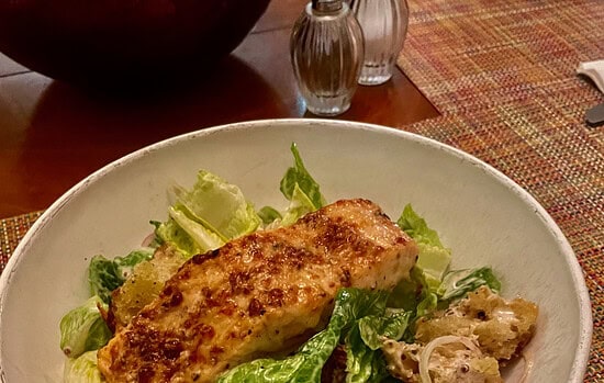 PARMESAN CRUSTED SALMON CAESAR SALAD