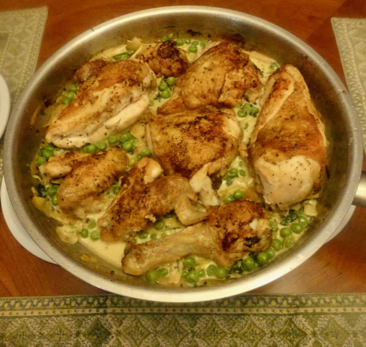 CRISPY-SKINNED CHICKEN WITH LEEKS AND PEAS: AN EARLY FALL BRAISE