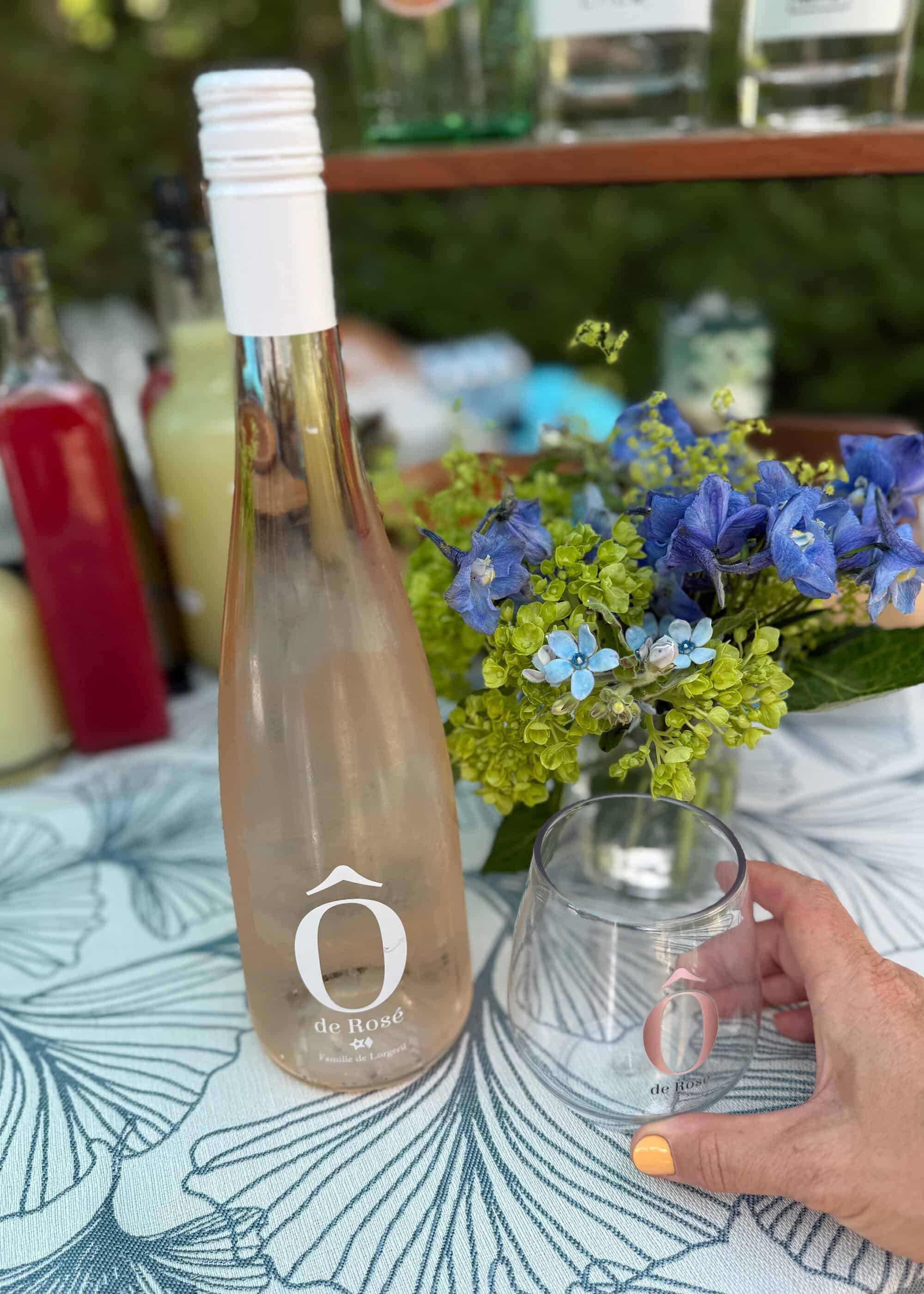 Ô de Rosé bottle and glass on a summer table in the Hamptons