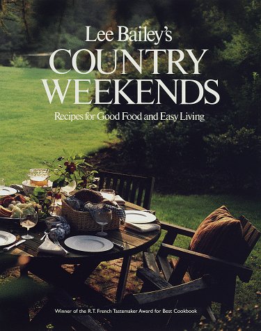 Book cover: Lee Bailey's Country Weekends — Recipes for Good Food and Easy Living — showing an outdoor dining table set for a meal on a manicured lawn with greenery in the background.